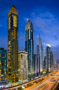 Aerial night view of the skyscrapers along the Sheikh Zayed Road in Dubai, UAE Aerial night view of the skyscrapers along the Sheikh Zayed Road in Dubai, UAE